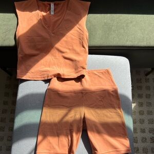 Athleta Rust Orange V-Neck Crop Top and High-Waist Bike Shorts Set